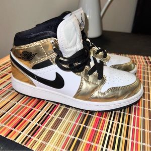 Girls Golden Jordan 1s